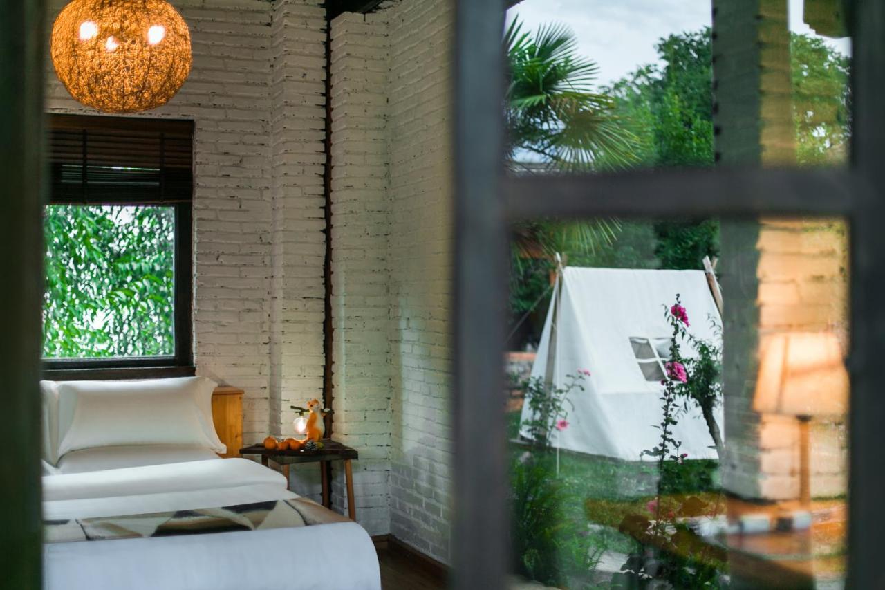 Adonis Inn Lijiang ลี่เจียง ภายนอก รูปภาพ