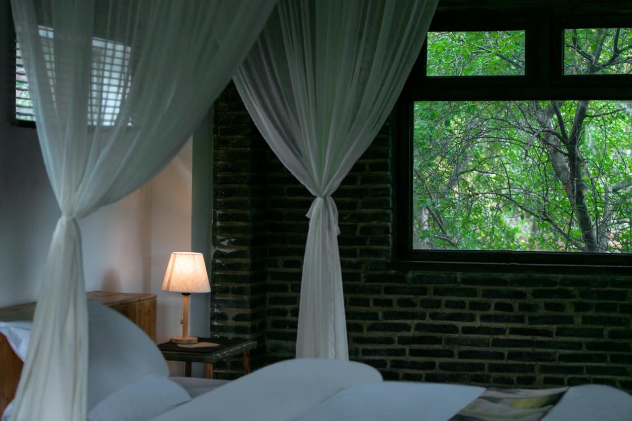 Adonis Inn Lijiang ลี่เจียง ภายนอก รูปภาพ